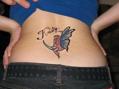 Татуировка на пояснице фея и месяц